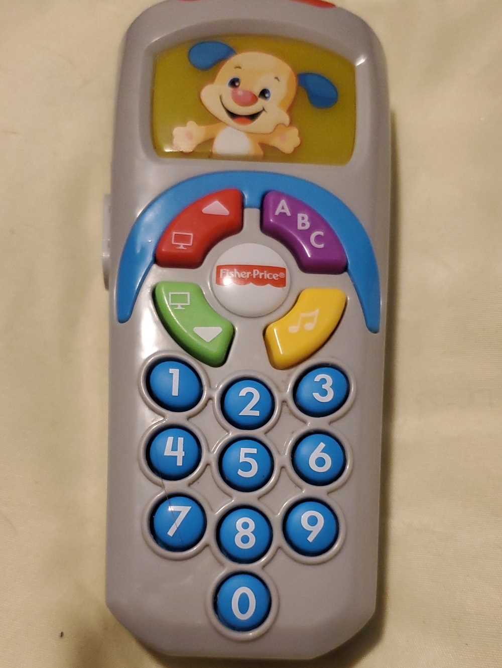 Fisher-Price Gray Toy Phone with Blue Buttons and Multi-Color Keys
